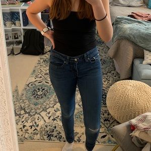 Ripped, Dark-wash Levi’s Skinny Jeans